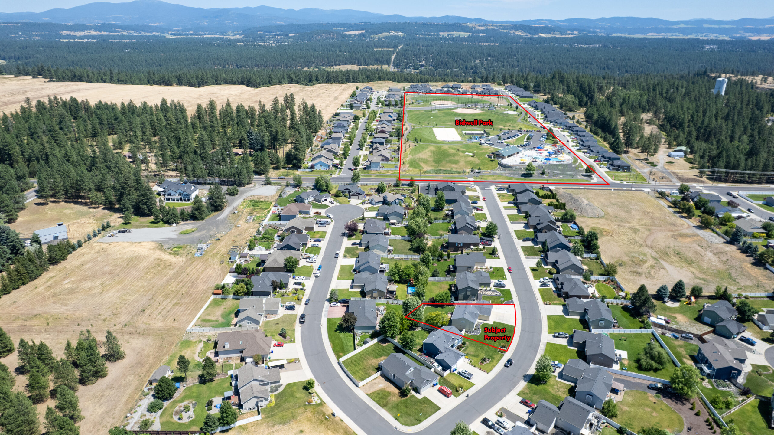 Aerial drone photo of the neighborhood with property lot lines marked