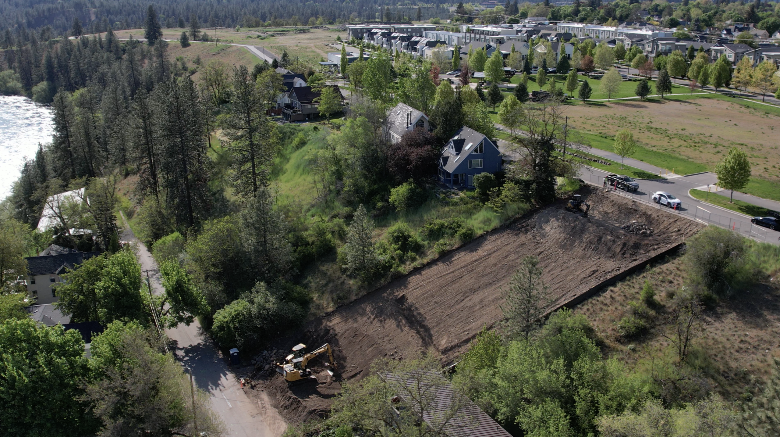 Aerial view of the site with clearing and grading underway